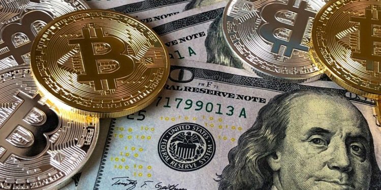 Dolar se stabilizovao, bitkoin poleteo još više na 52.640 dolara