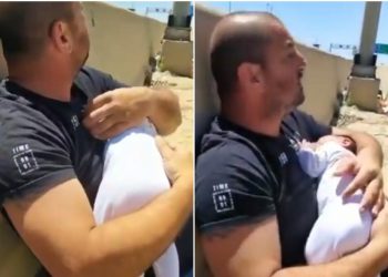 (VIDEO) OTAC DRŽI BEBU U NARUČJU DOK LETE RAKETE: Snimak opisuje sve užase sukoba na Bliskom istoku